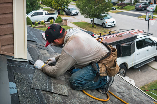 Professional Roofing technician working in Glendale, MA